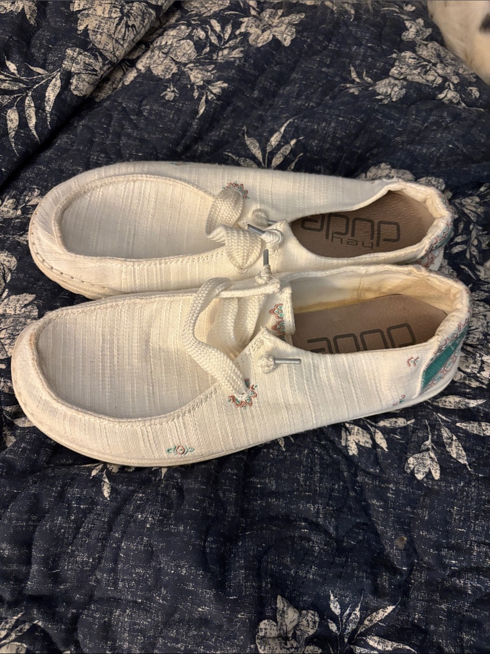 Hey Dude Women’s Cream Canvas Slip-On with Teal Embroidered Accents